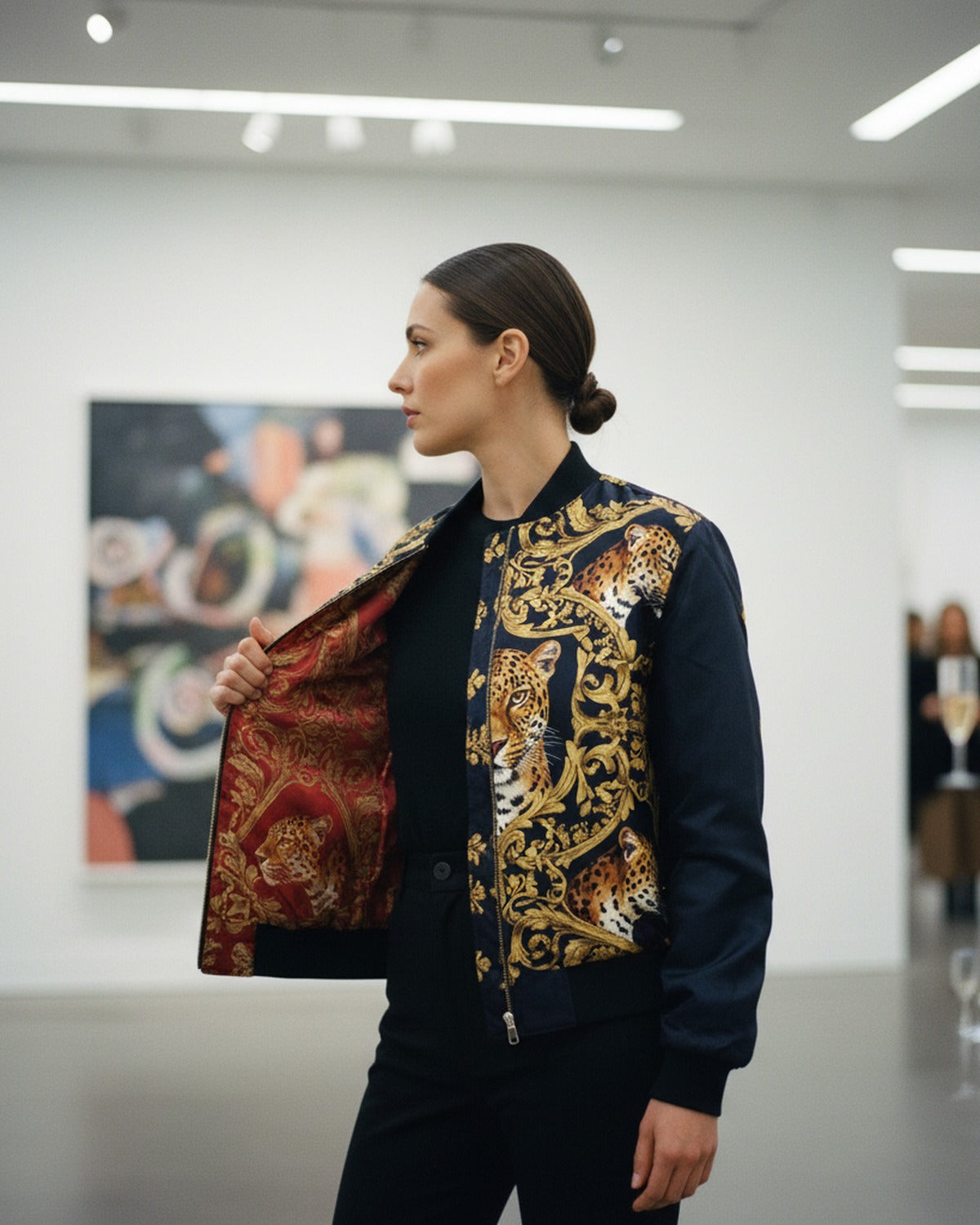L'Ordre du Léopard — Drape in motion on lapel reveal — supple leopard print silk satin — Hoboken atelier