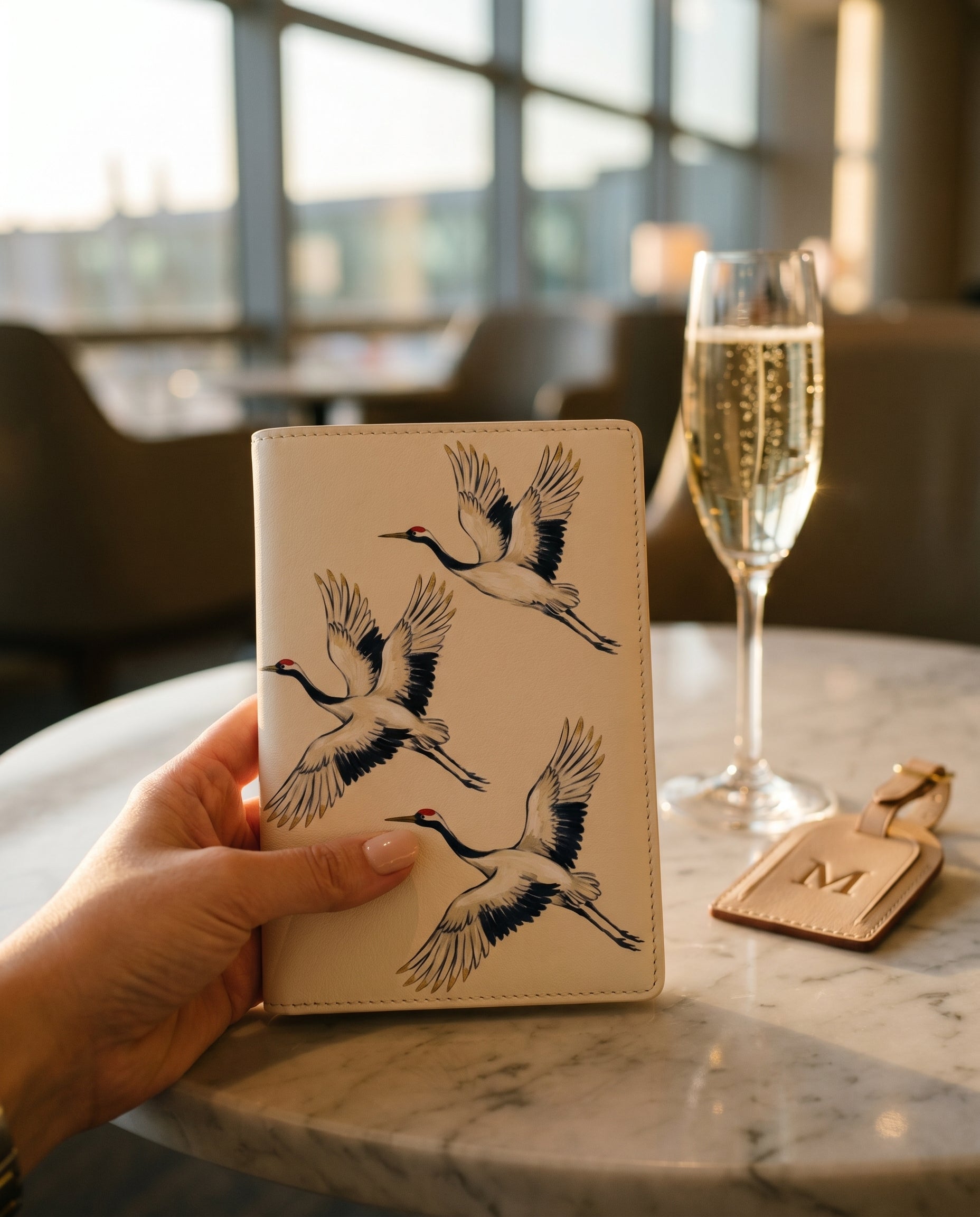 Carnet Grues du Japon — reverse / back view on light surface — finely finished Italian nappa leather — Hoboken atelier