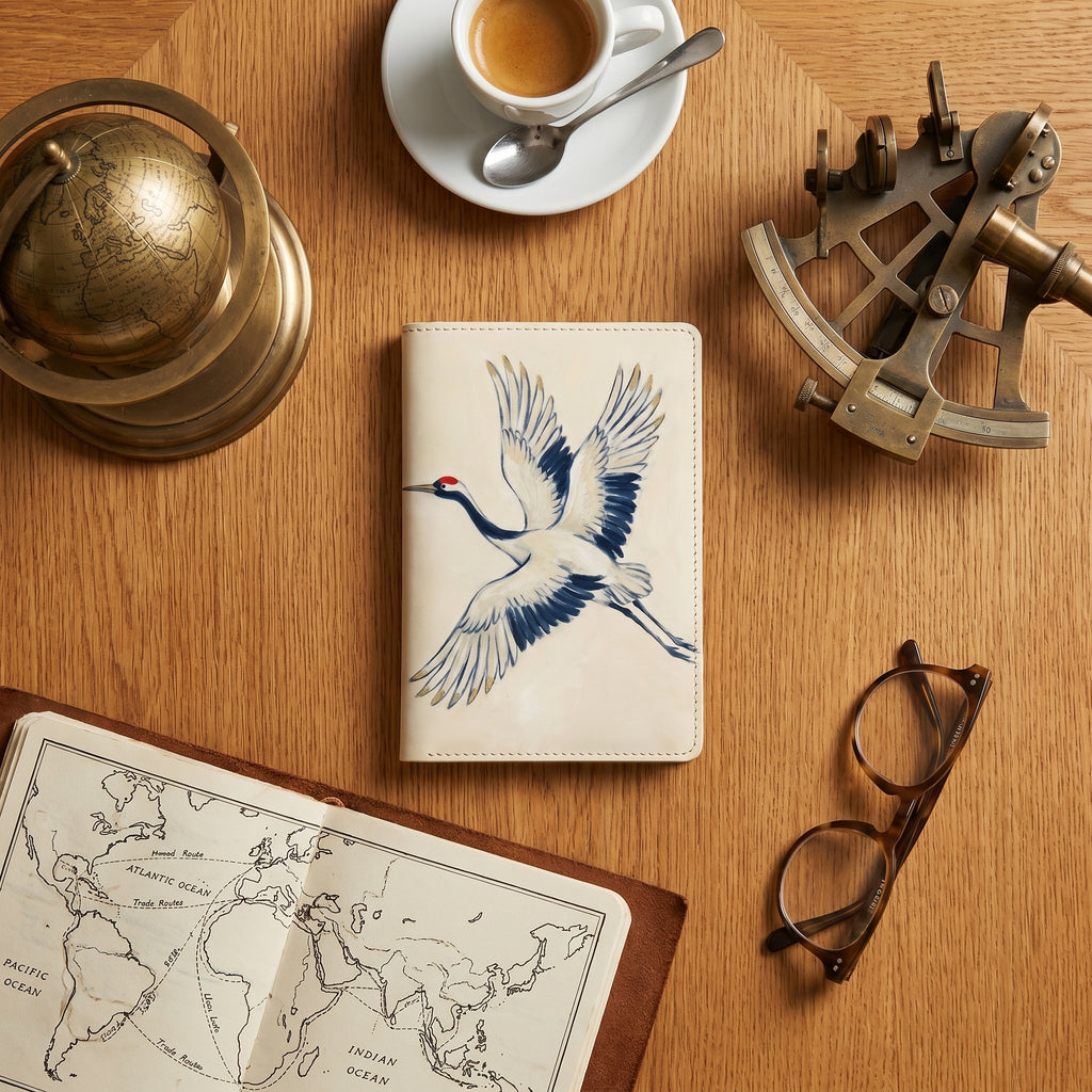 Carnet Grues du Japon — lifestyle context on atelier table — heritage Italian nappa leather accessory — Hoboken atelier