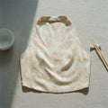 La Demoiselle — Halter Bridesmaid Dress hero flatlay on dusty rose — reactive-dyed mulberry silk charmeuse — Hoboken atelier