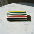 Pochette Hudson Bay — hero flatlay on ivory — hand-finished reactive-dyed mulberry silk — Hoboken atelier