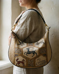 Le Demi-Lune in Le Bestiaire — hero flatlay on ivory — Italian nappa leather — Hoboken atelier