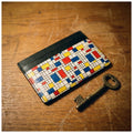 Carte Bauhaus Primaires — hero flatlay on ivory — Italian nappa leather card holder — Hoboken atelier