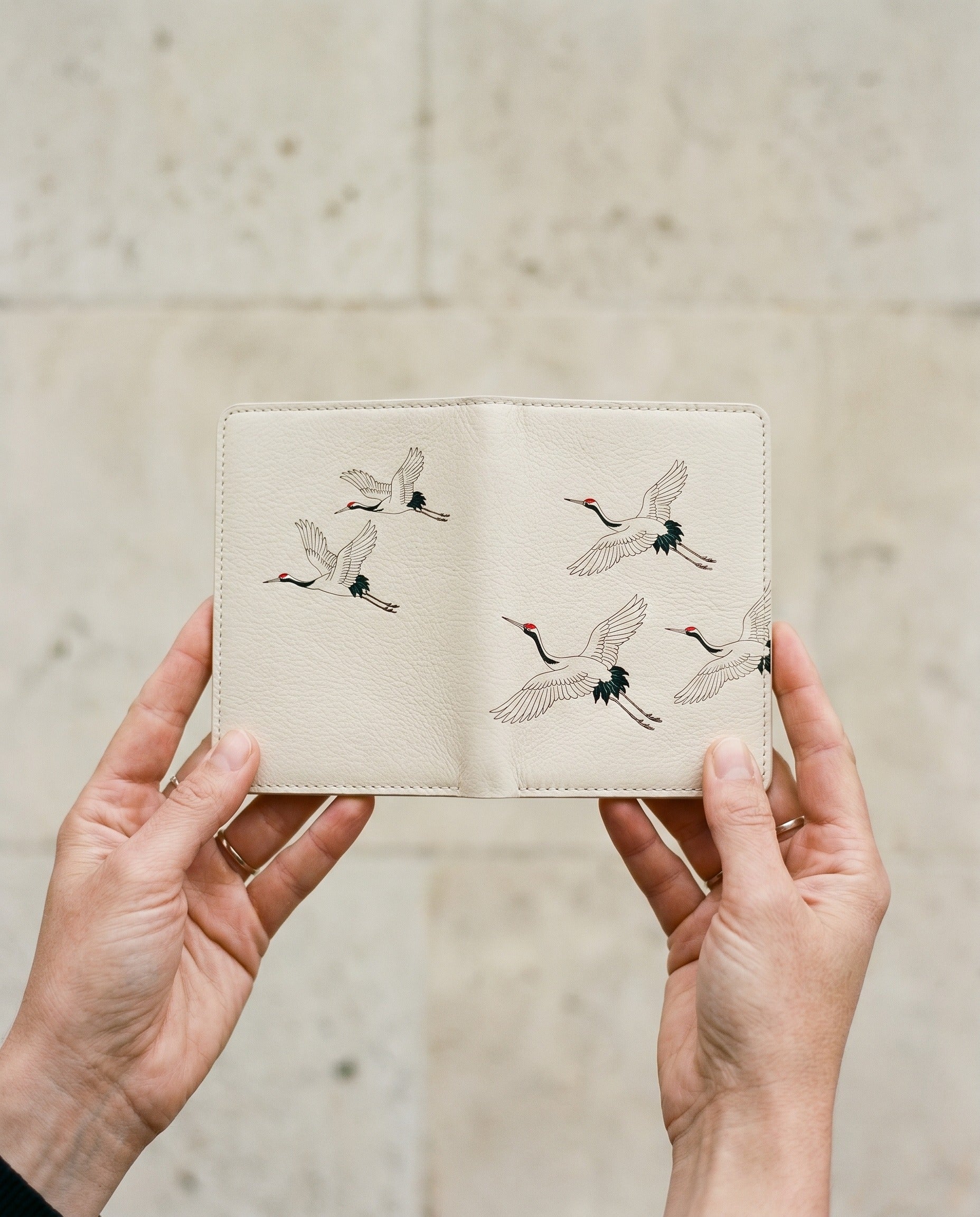 Carnet Grues du Japon — on-model editorial on warm tones — luxurious Italian nappa leather — Hoboken atelier