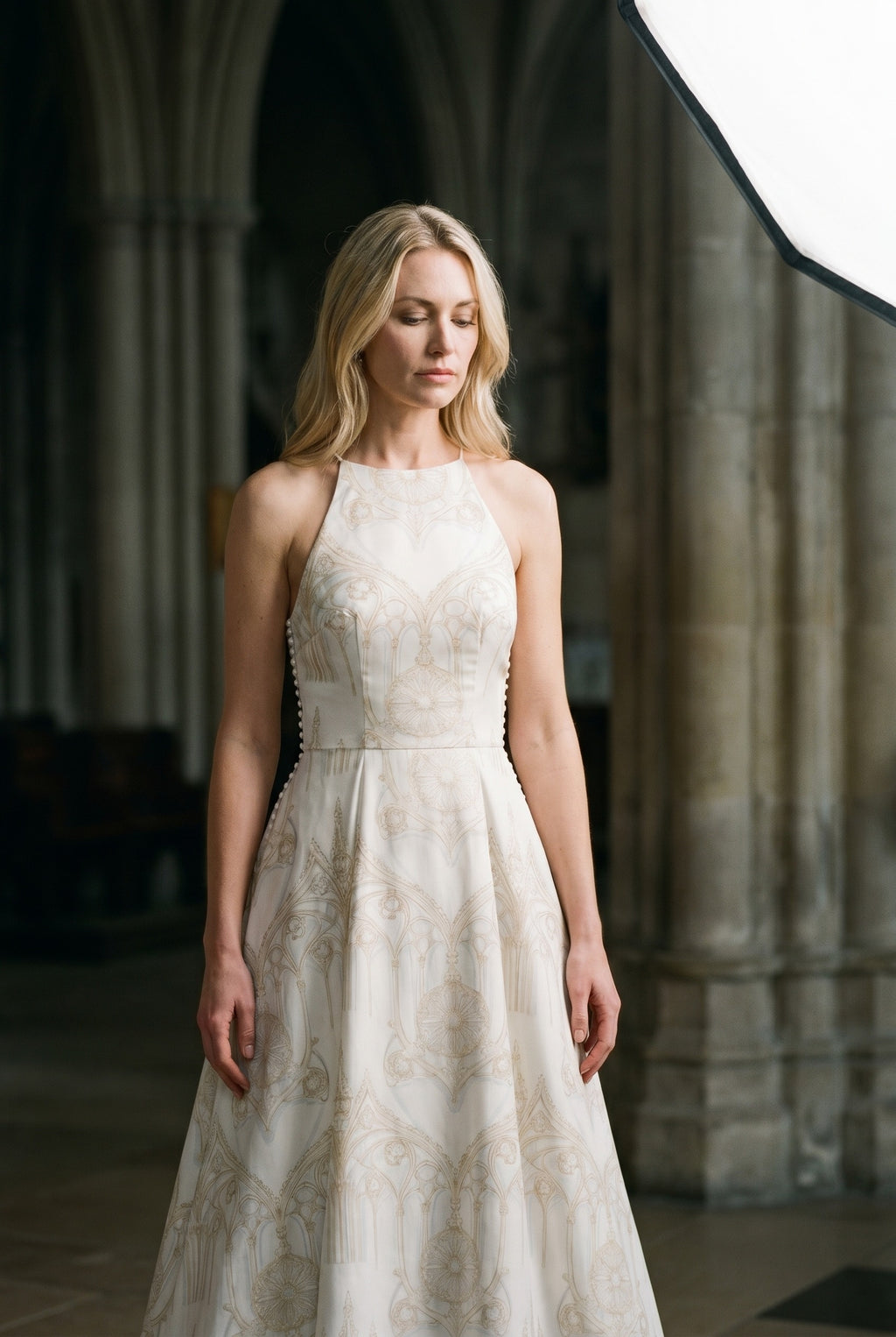 La Cathédrale — On-model editorial in historic hall — Halterneck wedding gown in quiet luxury silk — Hoboken atelier