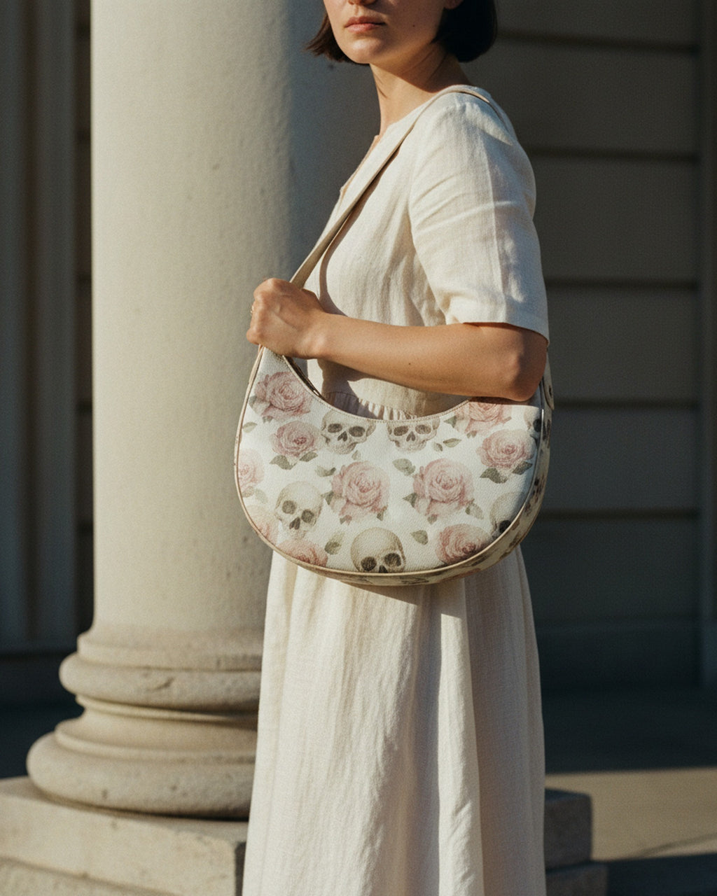 Le Demi-Lune in Memento Mori Floral — reverse view on a dark surface — hand finished Italian nappa leather and silk — Hoboken atelier